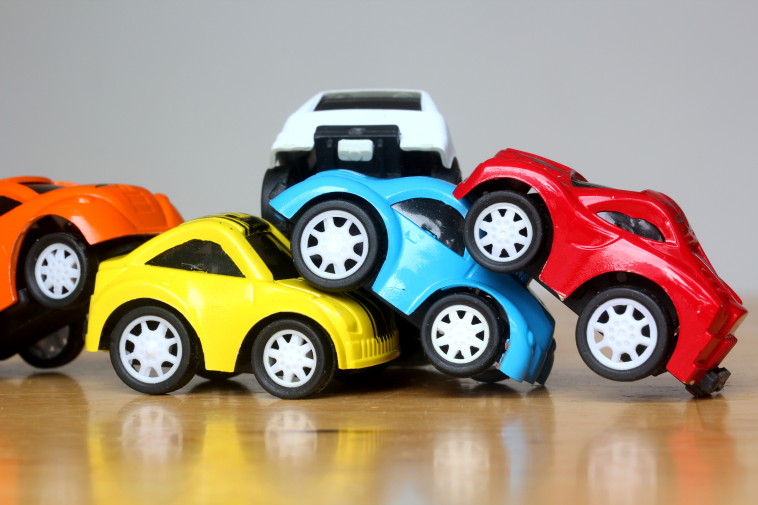toy cars in car parking disaster pile-up